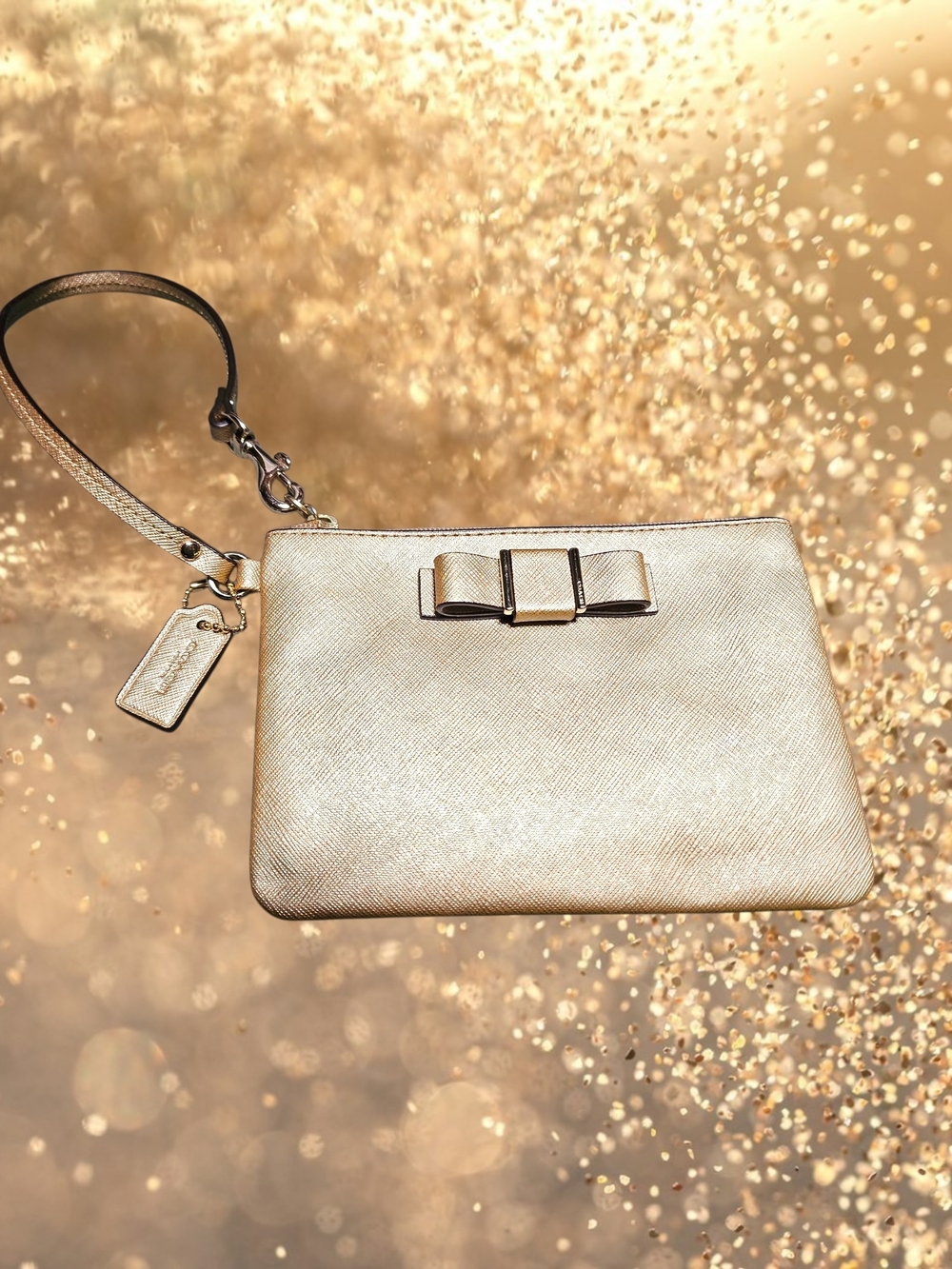 Coach Metallic Gold Bow Wristlet Clutch